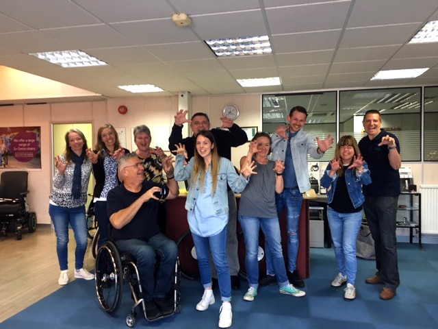 The Gerald Simonds Team wearing their denim for jeans for genes. 